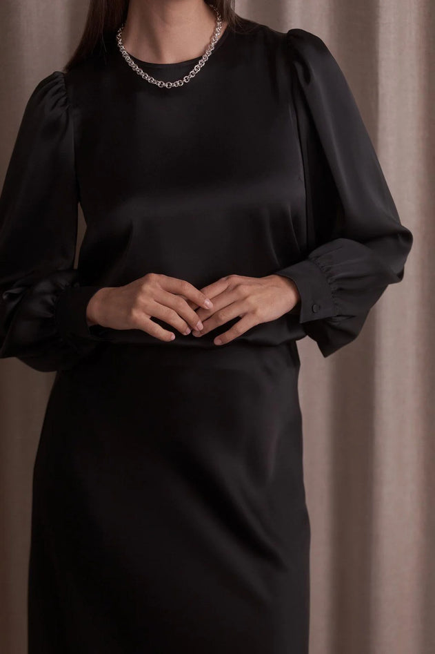 Original Story black puff sleeve blouse, cuff detail