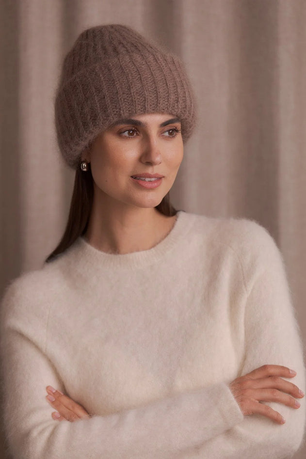Woman wearing Original Story brown chunky mohair beanie