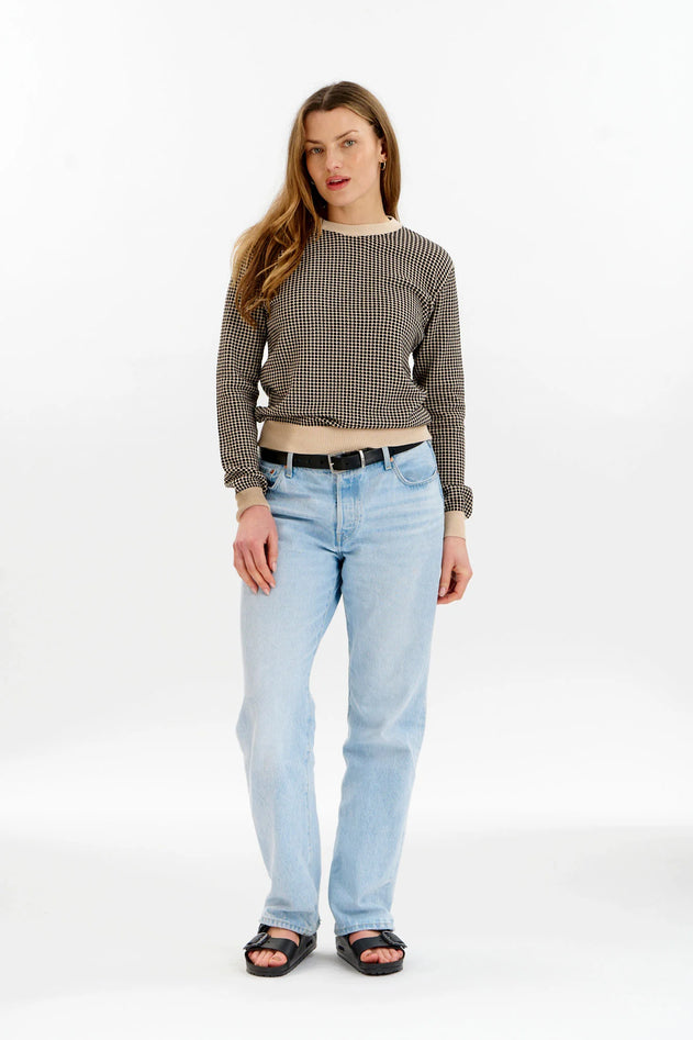 Close-up of cream and black jacquard knit texture