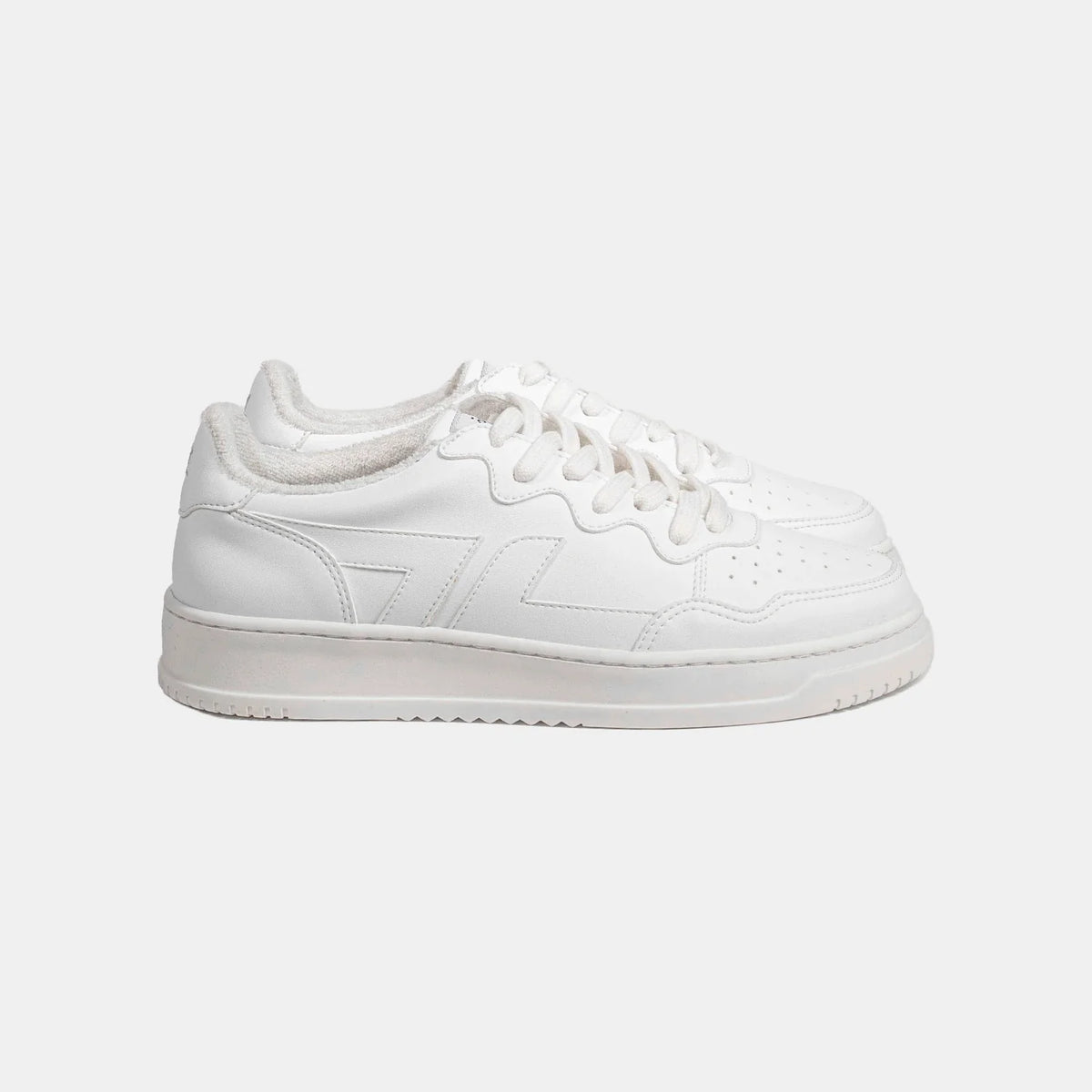 A pair of white, unisex, low-top sneakers with lace-up closure.
