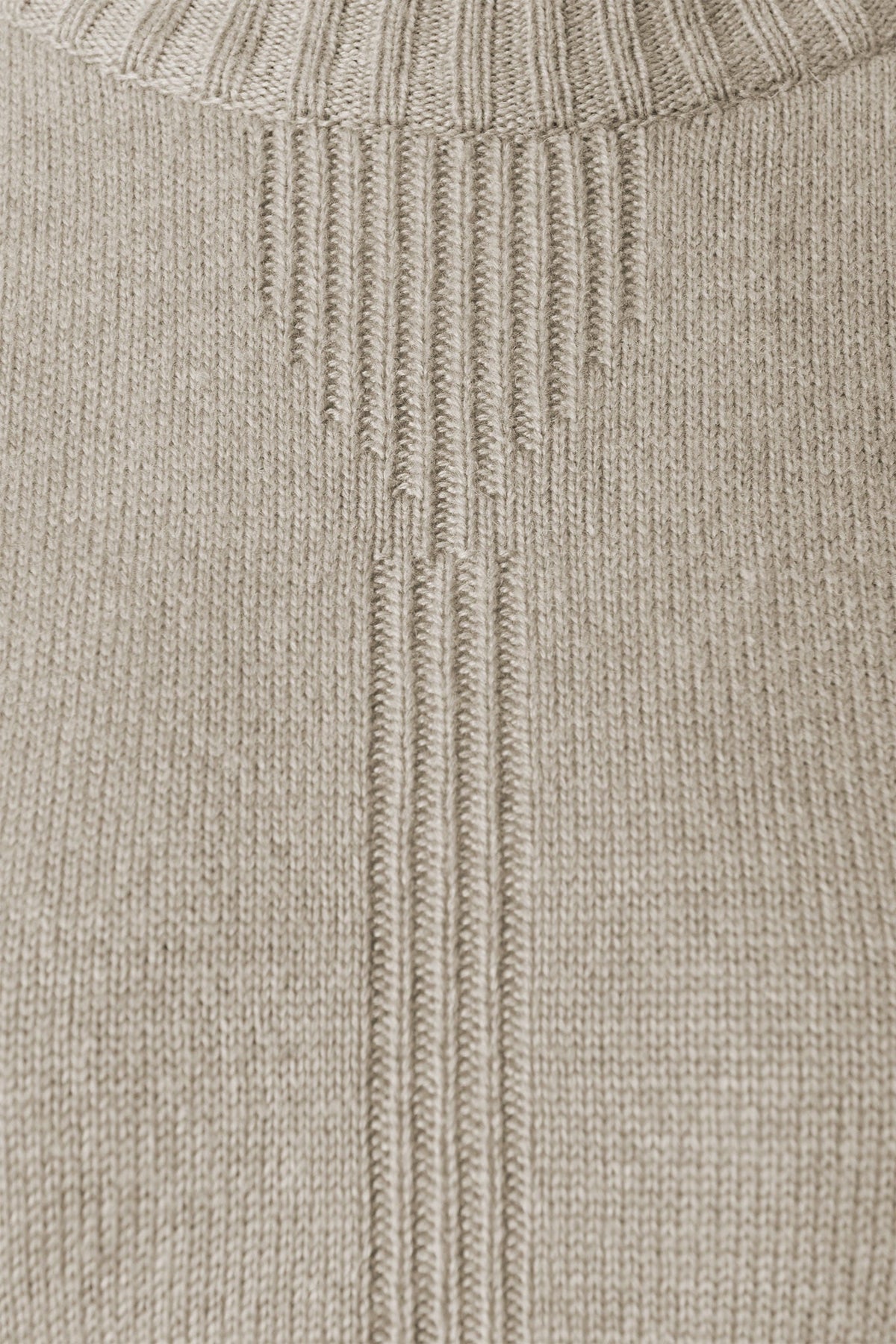 Close-up of beige merino wool knit texture