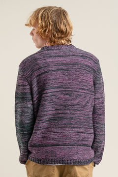 Man wearing Komodo fuchsia merino wool top