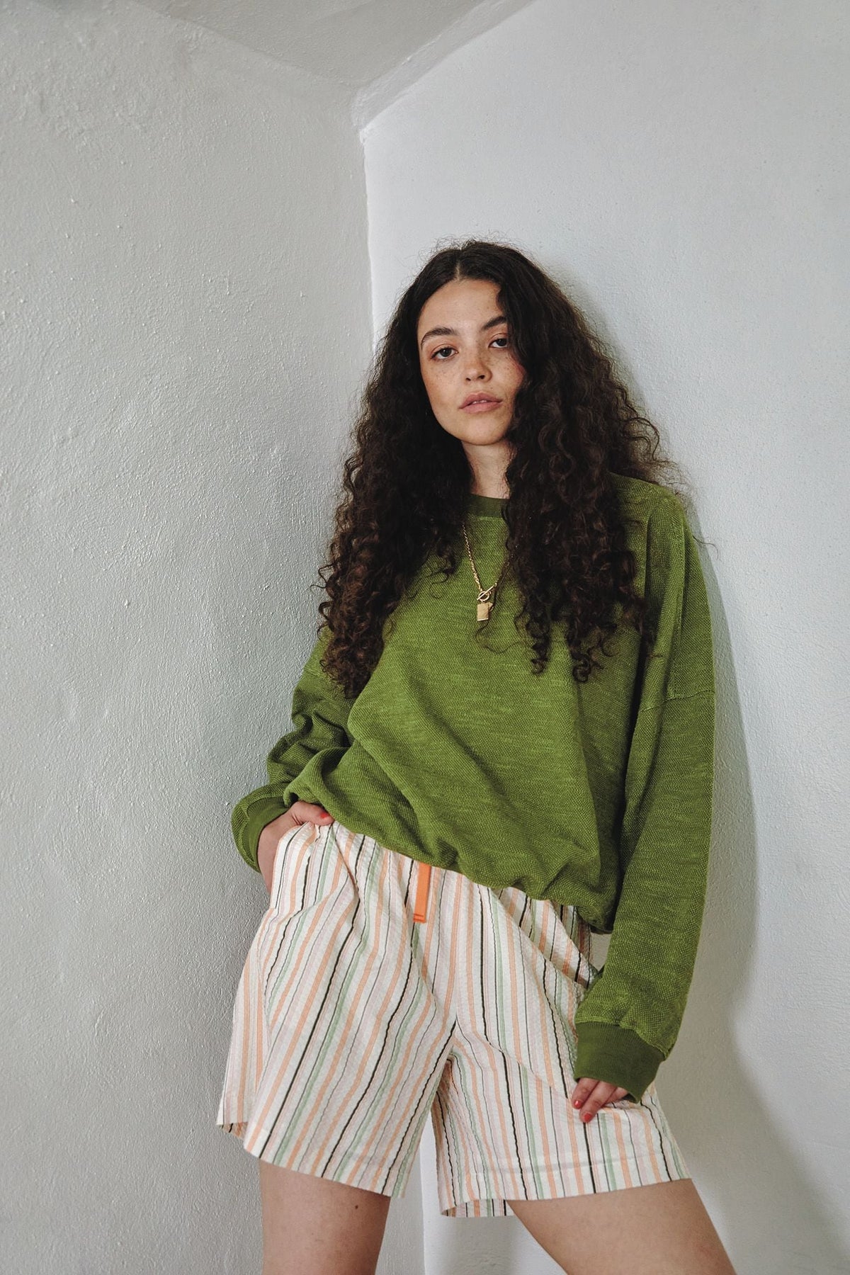 Green organic cotton sweater, front view