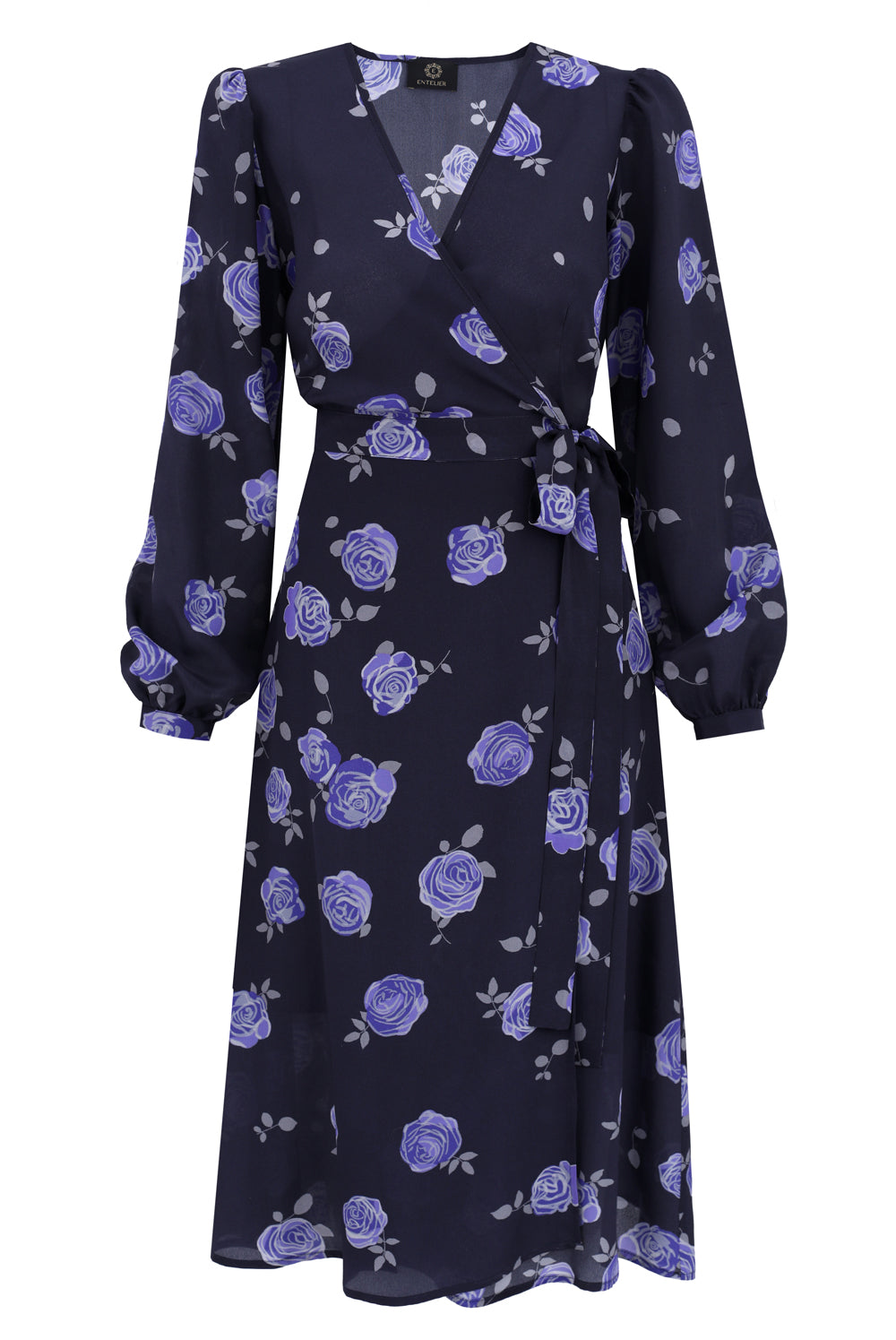 Navy blue silk envelope dress with a floral pattern of rose flowers in shades of sapphire, purple, and gray, featuring short, slightly buffed sleeves and a waist tie.