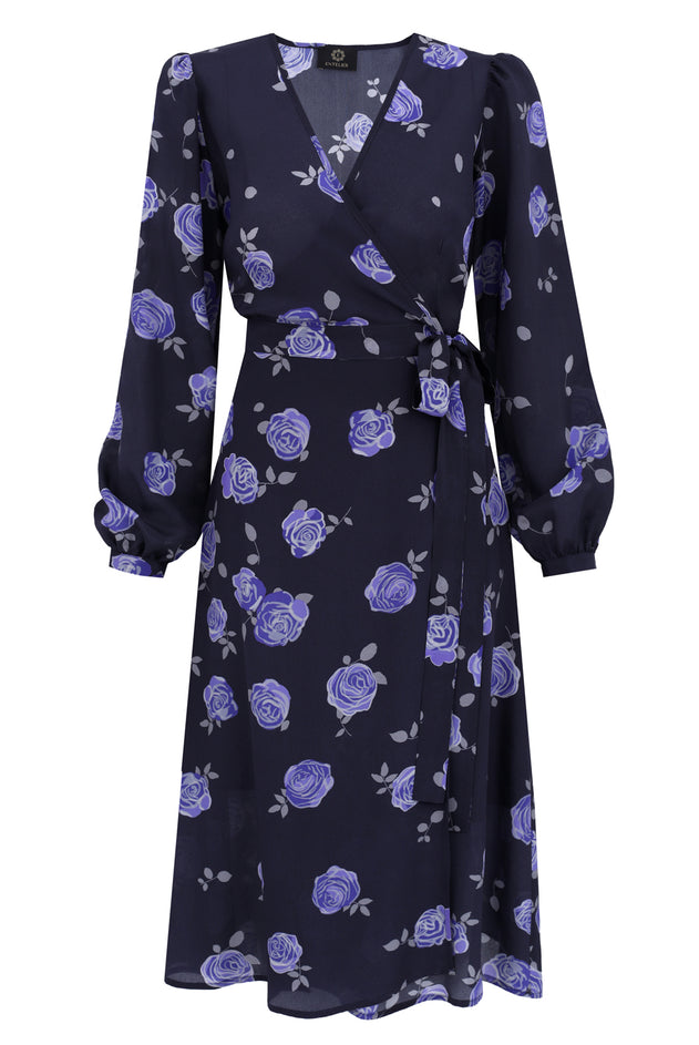 Navy blue silk envelope dress with a floral pattern of rose flowers in shades of sapphire, purple, and gray, featuring short, slightly buffed sleeves and a waist tie.